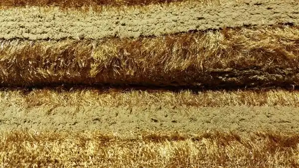 Weekendaanbieding Bruine\\/okerkleurige teddyachtige stof met glitter strepen