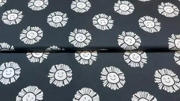 Zwarte stretch katoen tricot met witte zonnetjes Actieprijs